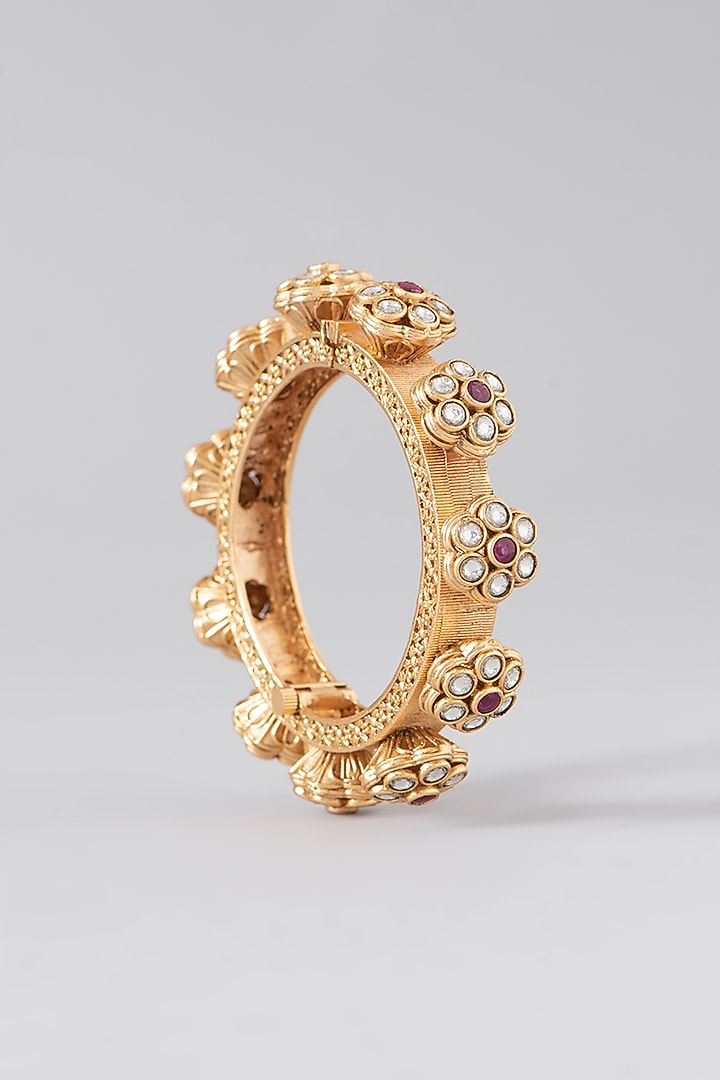 Gold Finish Kundan Polki & Red Stone Bangles (Set Of 2) by VASTRAA Jewellery at Pernia's Pop Up Shop